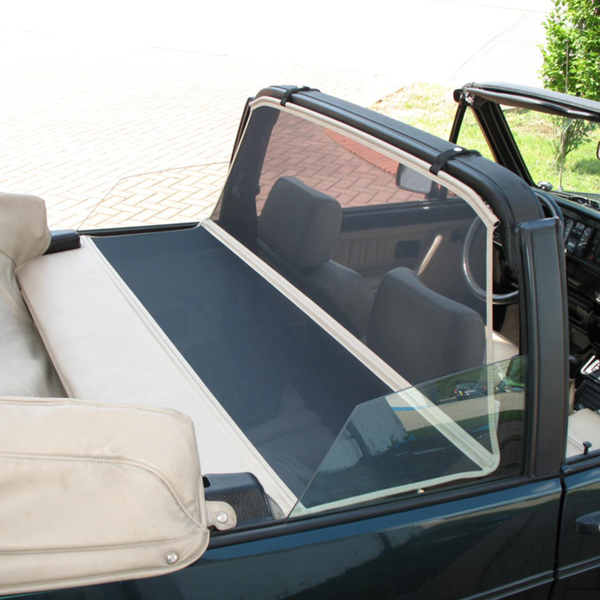 a bodi xlc wind deflector in a green vw golf 1