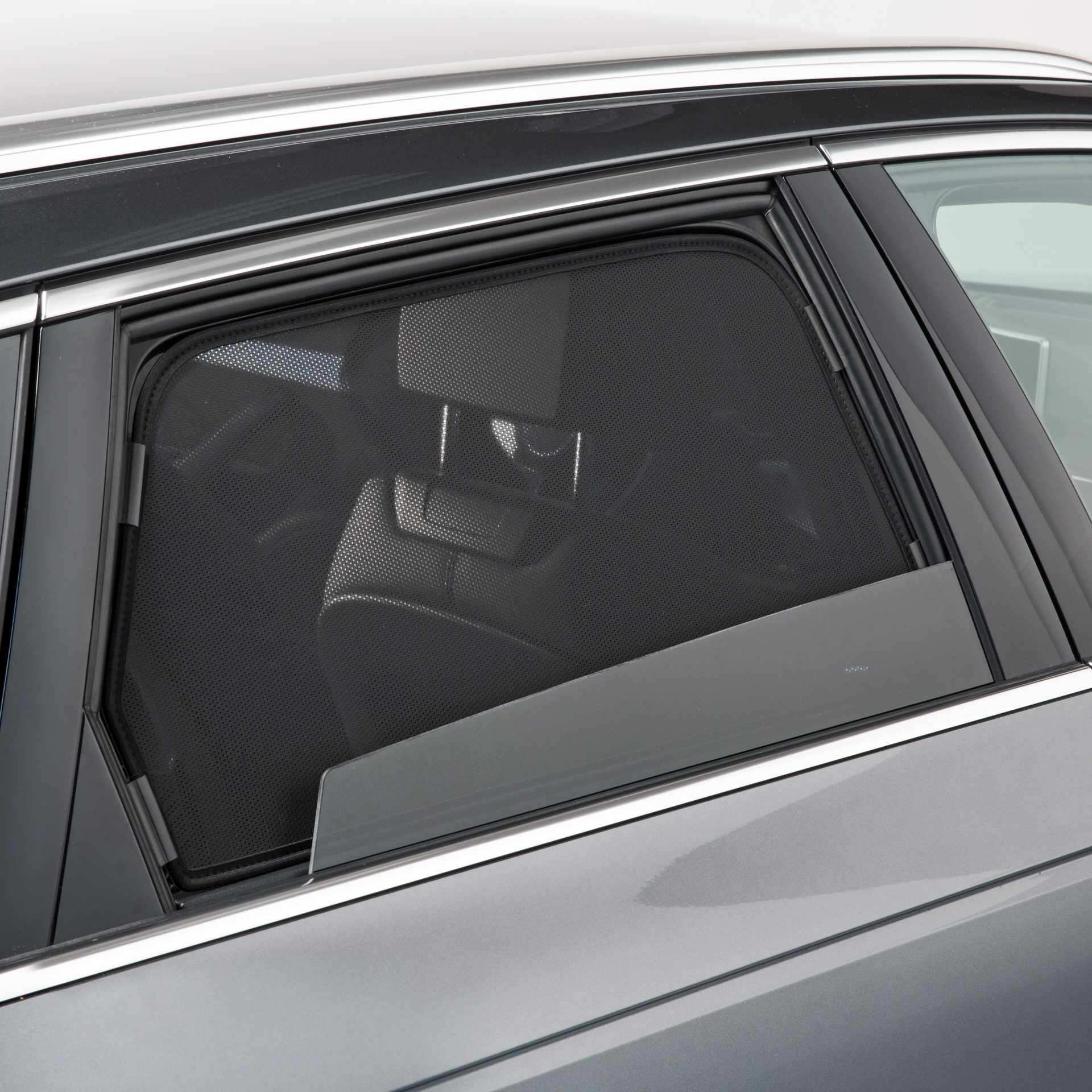 a sun screen is installed at a loweredcar window 