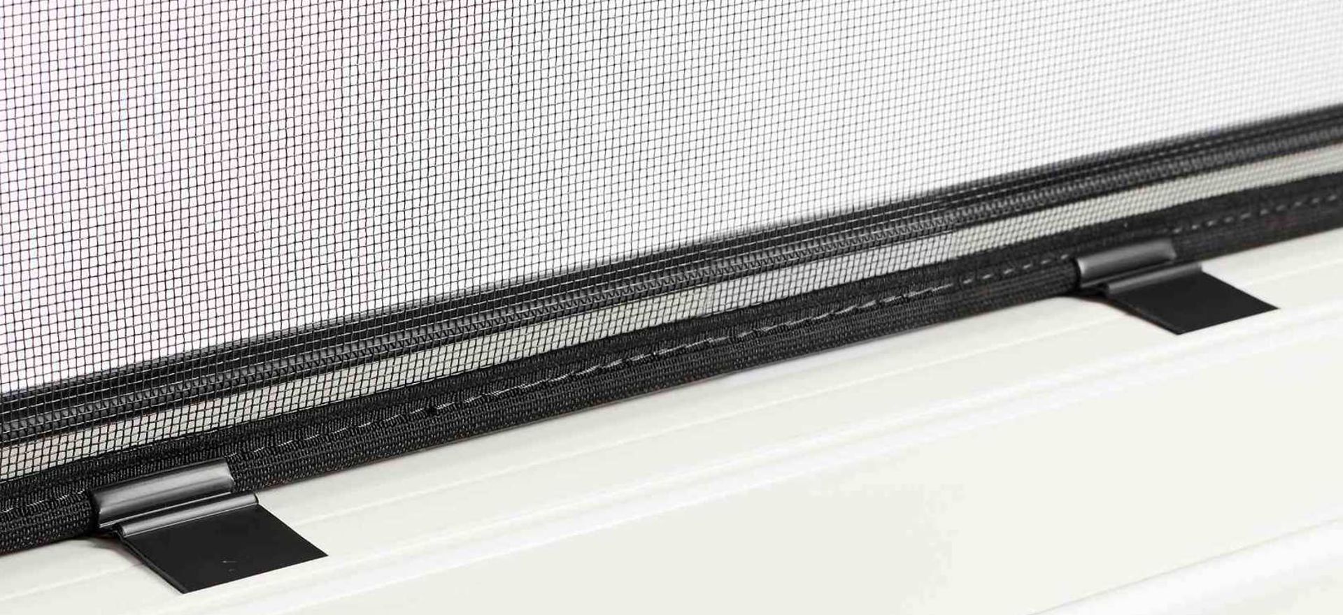 The right insect screen for the window detailed picture of the fly screen with two plastic holders