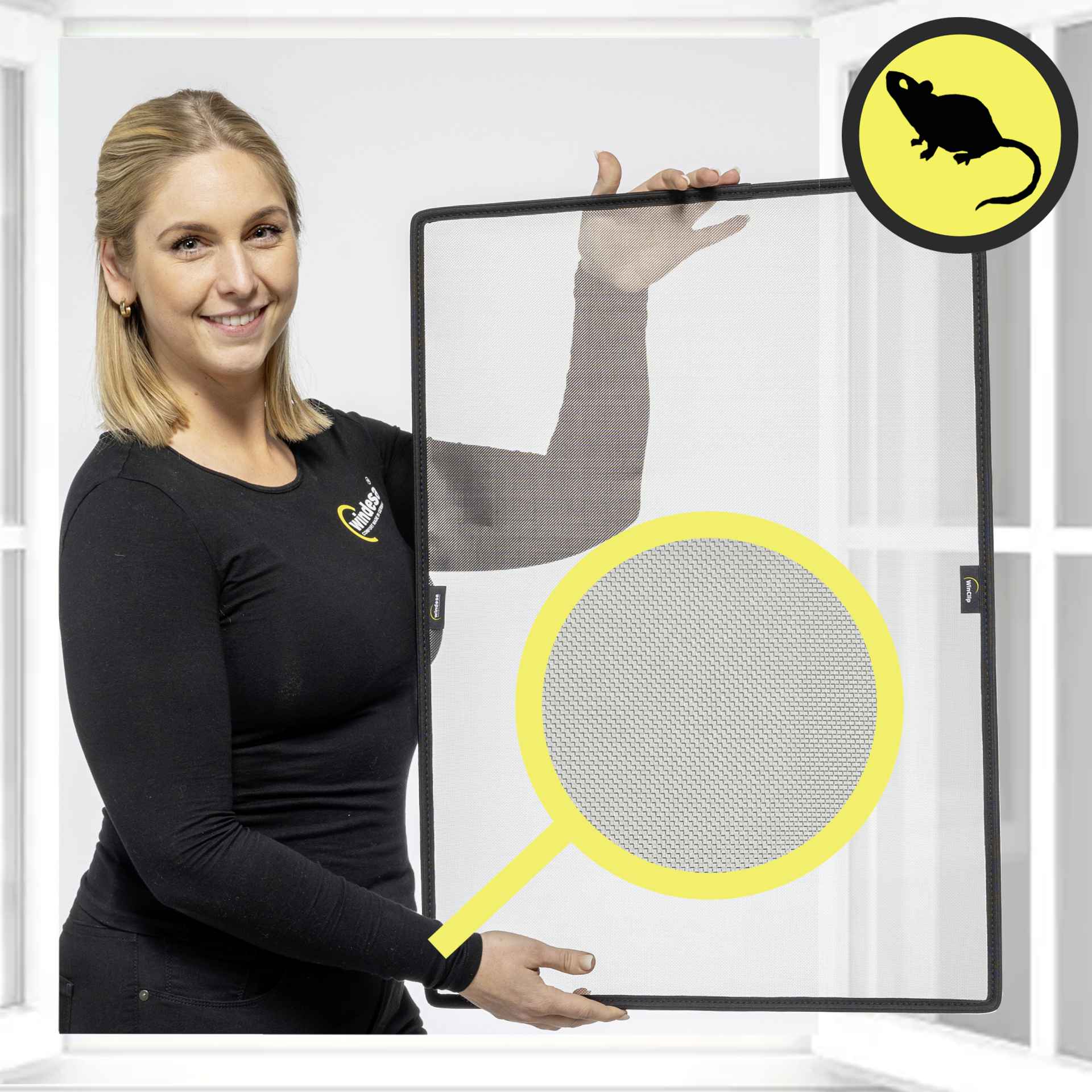 WinClip MULTI Safe rodent protection stainless steel for all windows a smiling woman holds the WinClip Safe in her hands